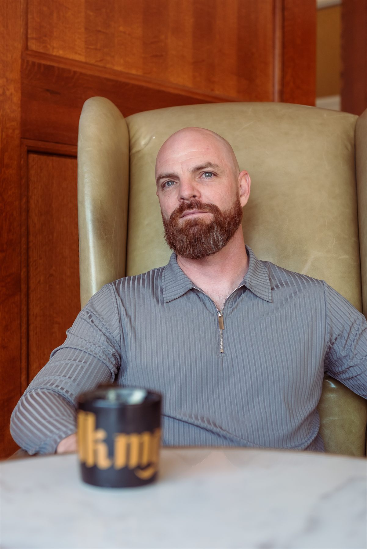Jeremy seated in a leather chair.